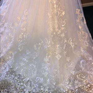 Eddy K dress only worn to try on! Beautiful details and sized to fit a size 2/4.